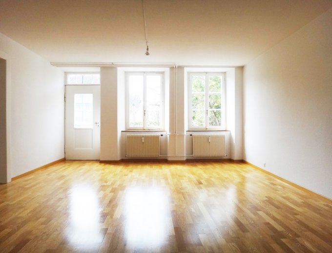 Stilvolle 4-Zimmerwohnung mit Sitzplatz im Dorfkern ...